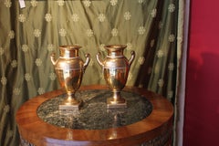 Pair of French Empire Period Matte and Burnished Gilt Porcelain Vases