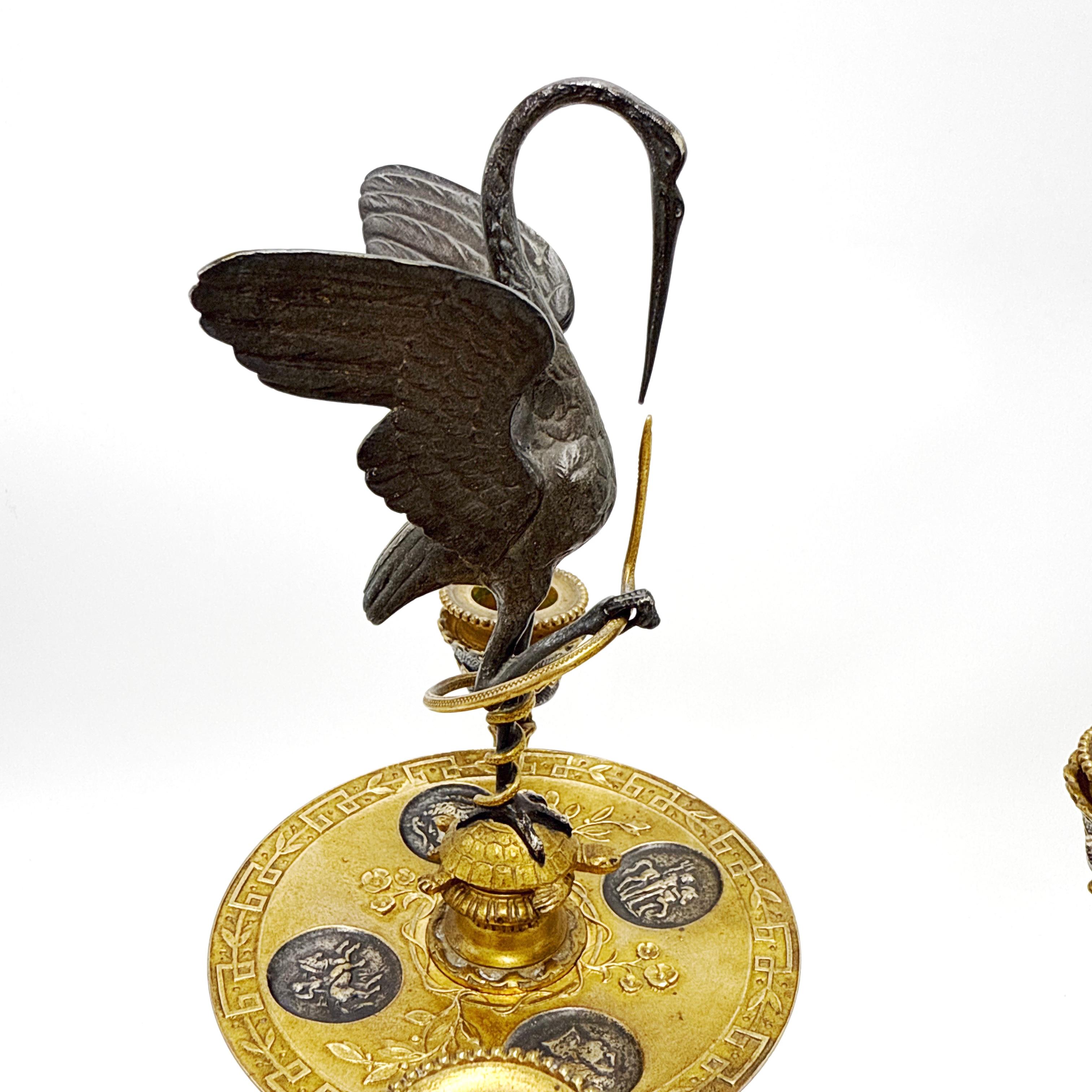 Pareja de candelabros de bronce dorado y patinado de renacimiento imperio francés Bronce en venta