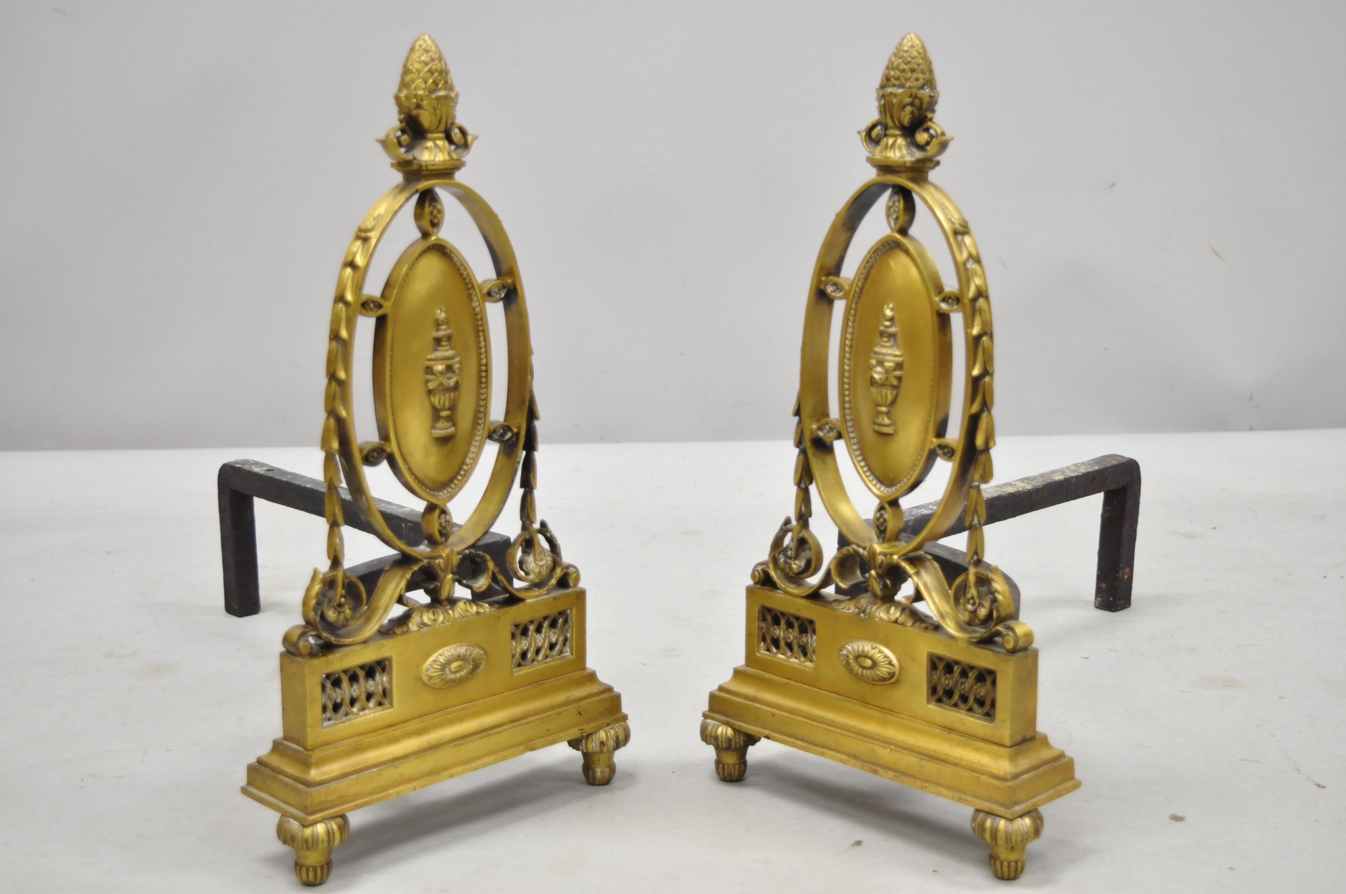Pair of antique French Empire Sheraton style brass bronze urn acorn fireplace andirons, circa late 19th century. Measurements: 16.5