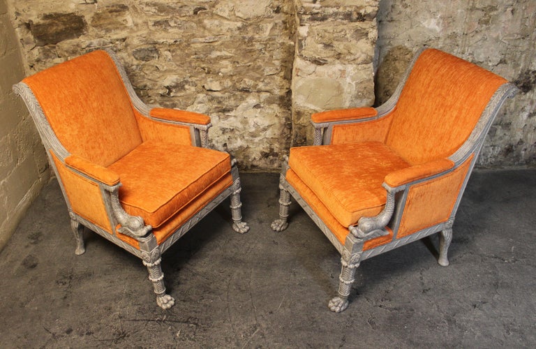 Pair of 20th century French Empire style carved wood and newly upholstered chairs.