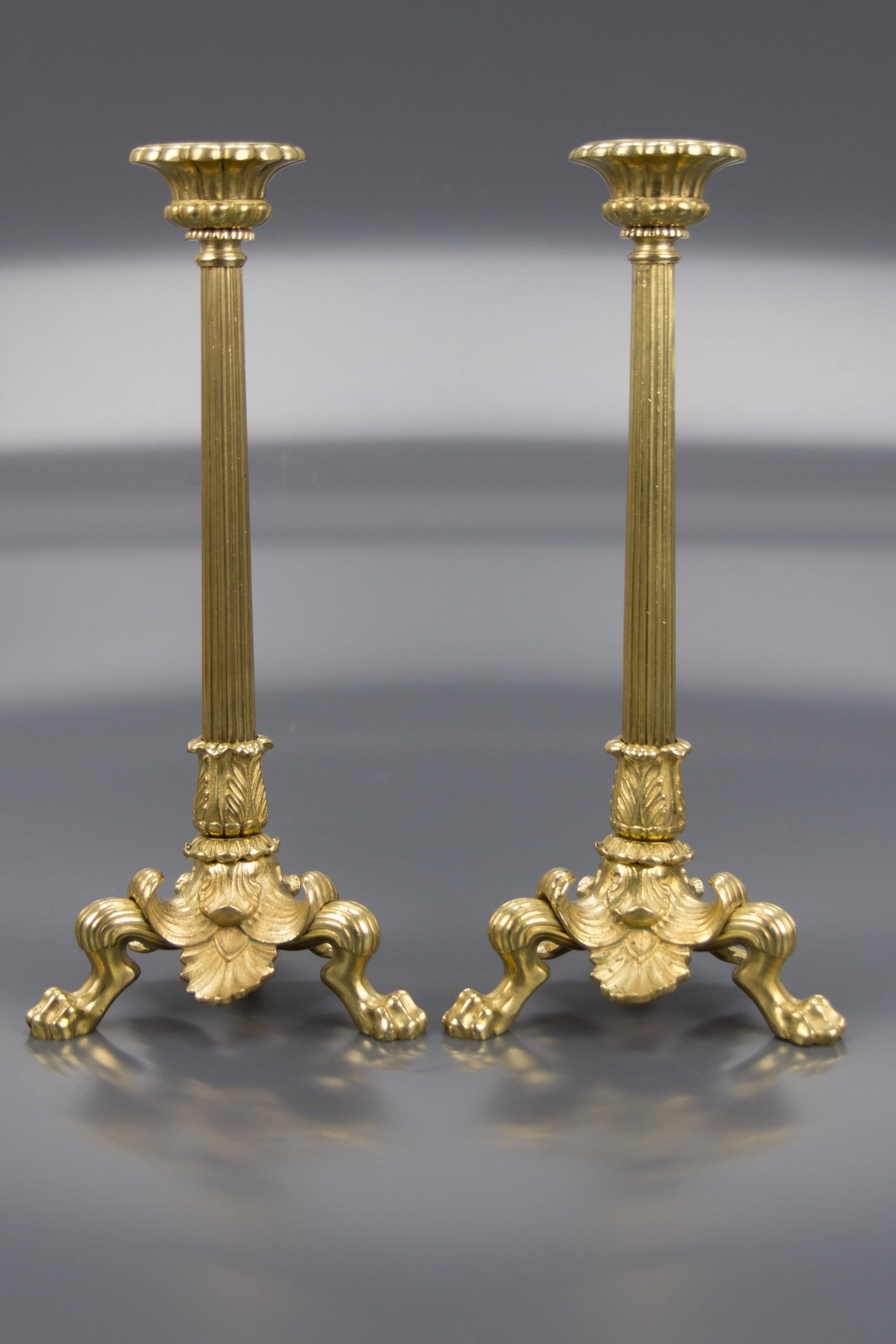 Mid-20th Century Pair of French Empire Style Brass and Bronze Candlesticks on Tripod Lion Paws