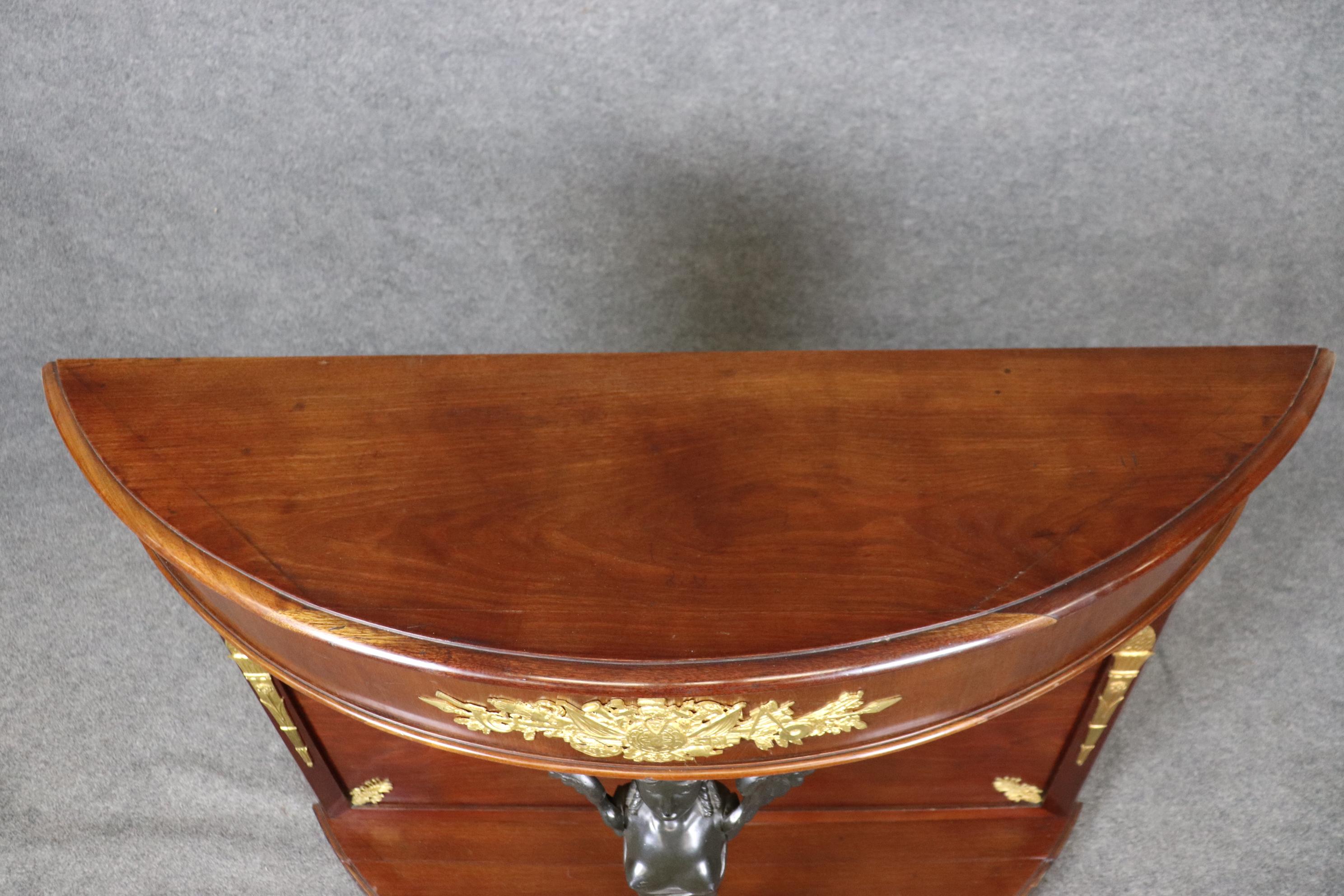 20th Century Pair of French Empire Style Bronze Mounted Demilune Mahogany Console Tables For Sale