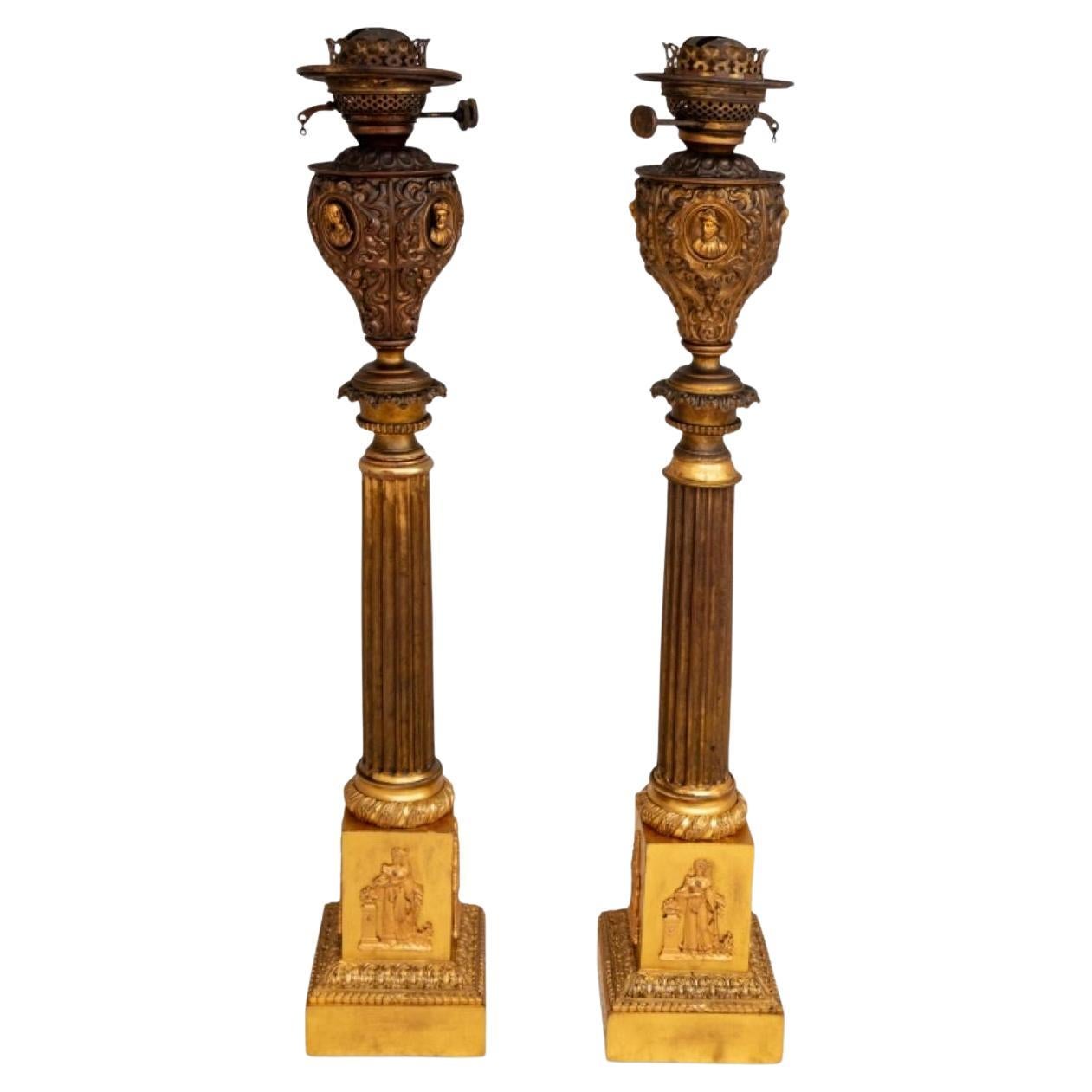 Paire de lampes en bronze de style Empire français