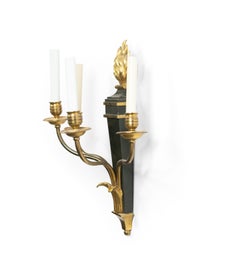 Pair of French Empire Style Ebonized and Gilt Four-Arm Wall Sconces