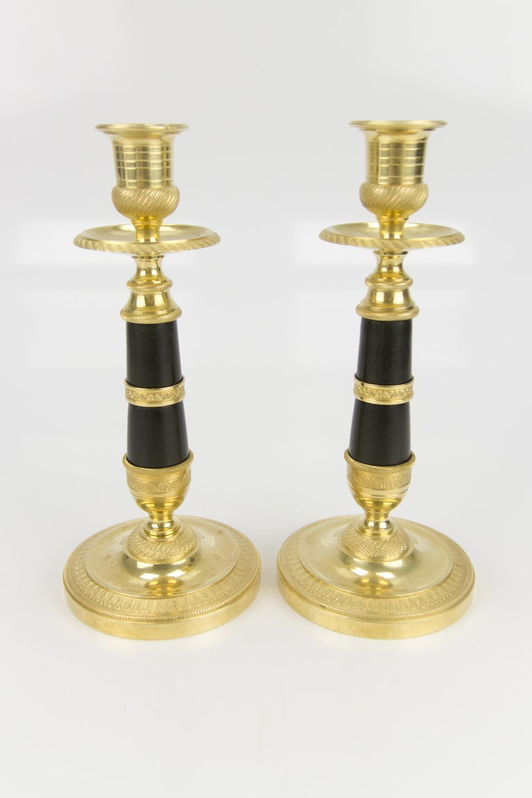 Pair of French Empire Style Gilt Bronze and Patinated Brass Candlesticks  For Sale at 1stDibs
