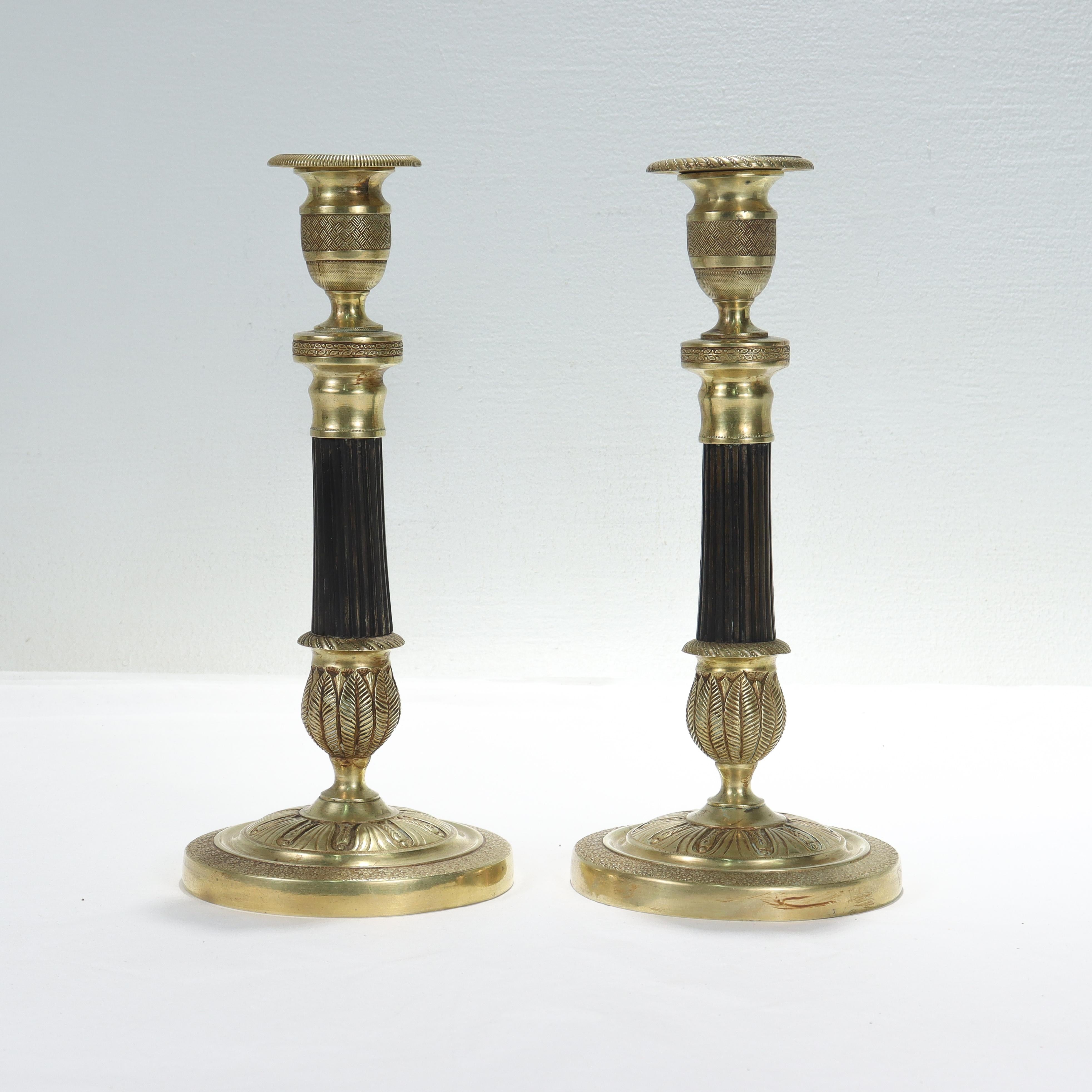 Pair of French Empire Style Gilt Bronze Candlesticks In Good Condition For Sale In Philadelphia, PA