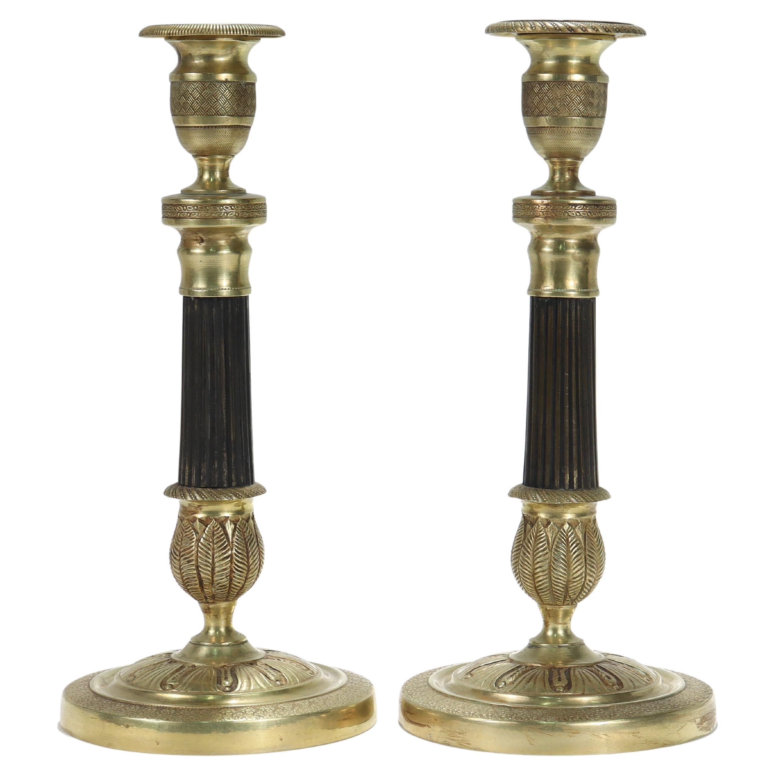 Pair of French Empire Style Gilt Bronze Candlesticks For Sale