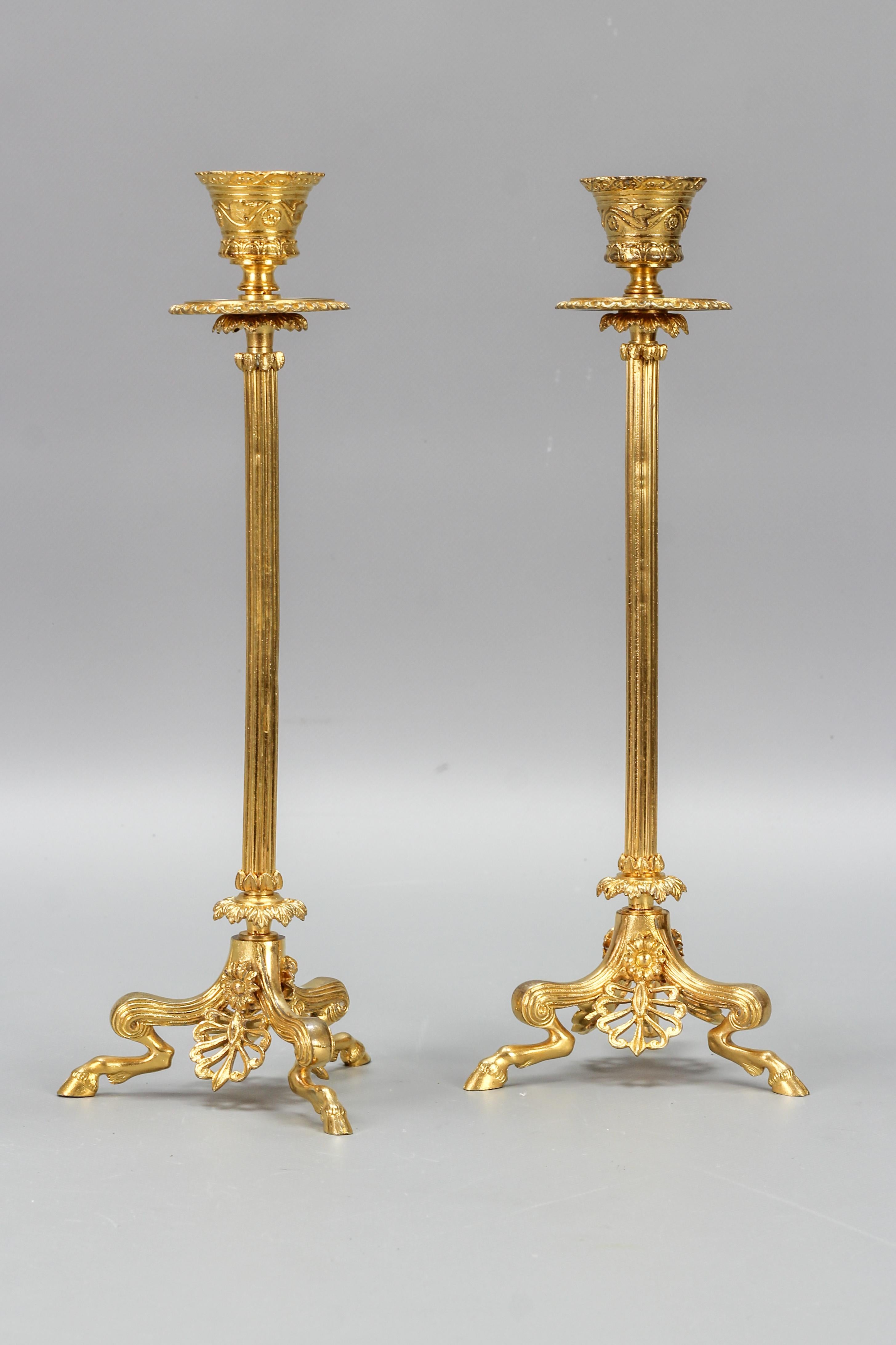 Late 19th Century Pair of French Empire Style Gilt Bronze Candlesticks on Hoofed Faun Feet For Sale