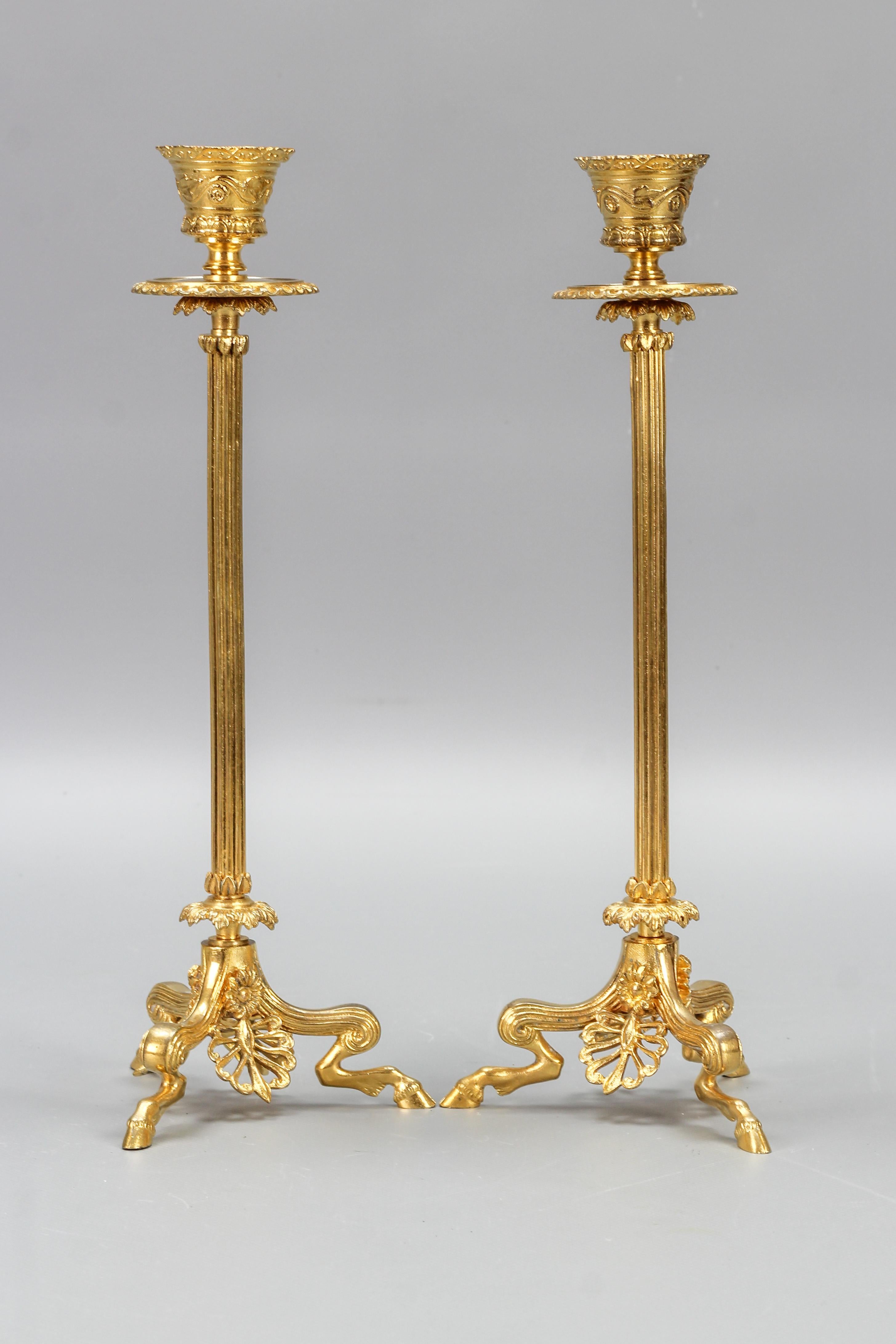 Pair of French Empire Style Gilt Bronze Candlesticks on Hoofed Faun Feet For Sale 1