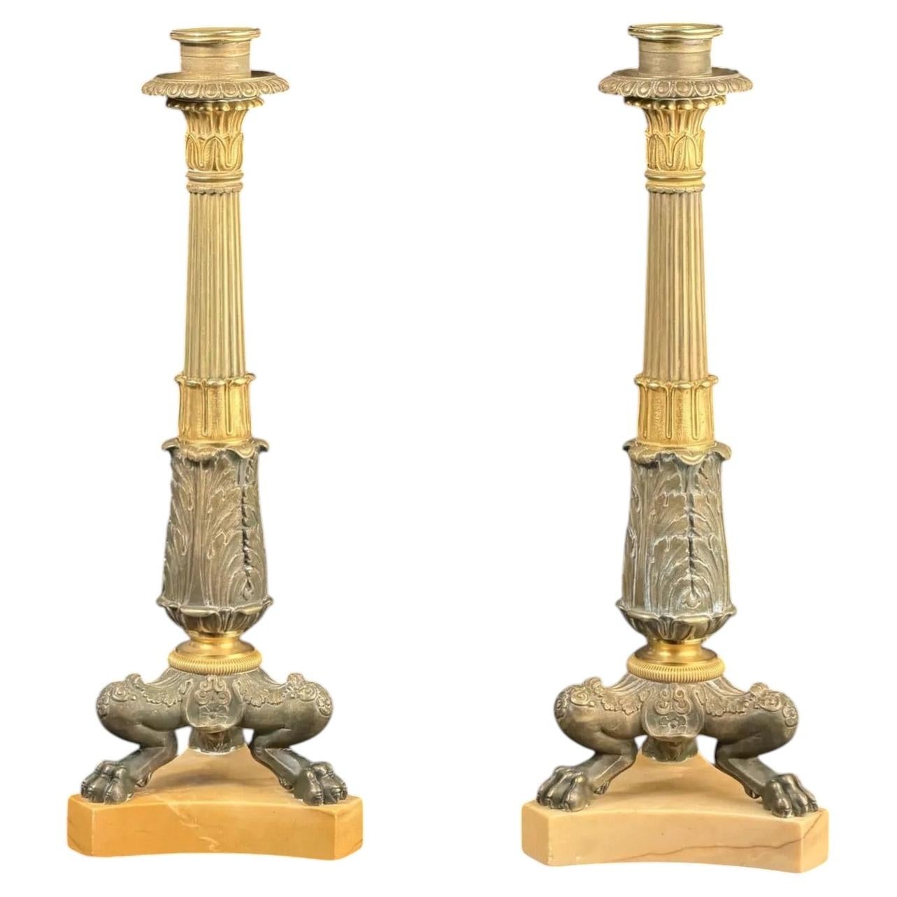 Pair of French Empire Style Gilt & Patinated Bronze Candlesticks on Marble Base For Sale