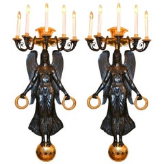 Pair of French Empire Style Patinated and Gilt Bronze Victory Sconces