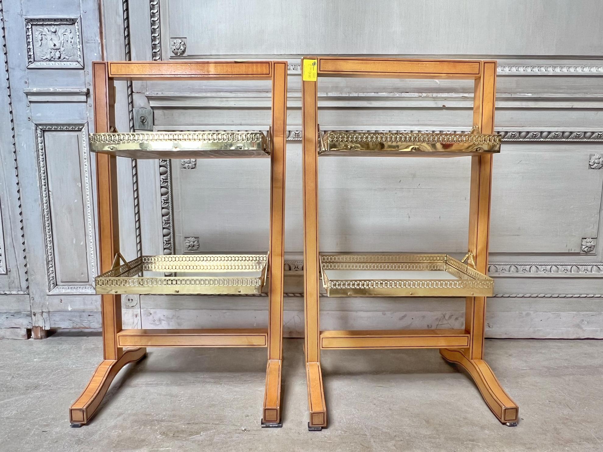 A pair of Italian maple etigeres with two mirrored shelves with a pierced brass gallery. There are 4 of these tables available. These side tables would be ideal in a bathroom or next to a chair. They would also great for small books or to display a