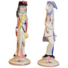 Pair of French Faience Decorated Candlesticks of Doctor & Patient