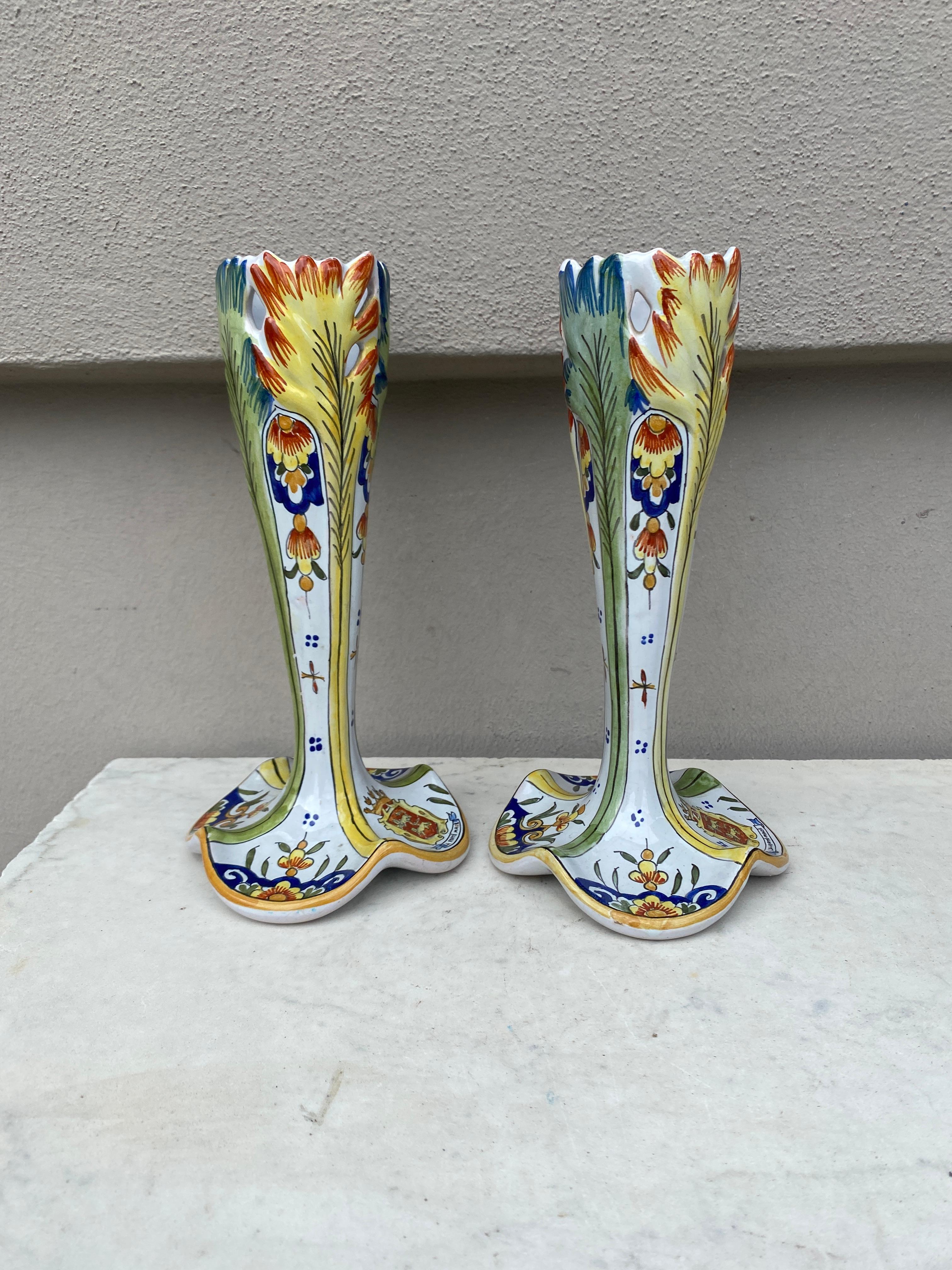 Pair of French Faience Vases Circa 1900.
Decorated with leaves on the top , coat of arms on the base.