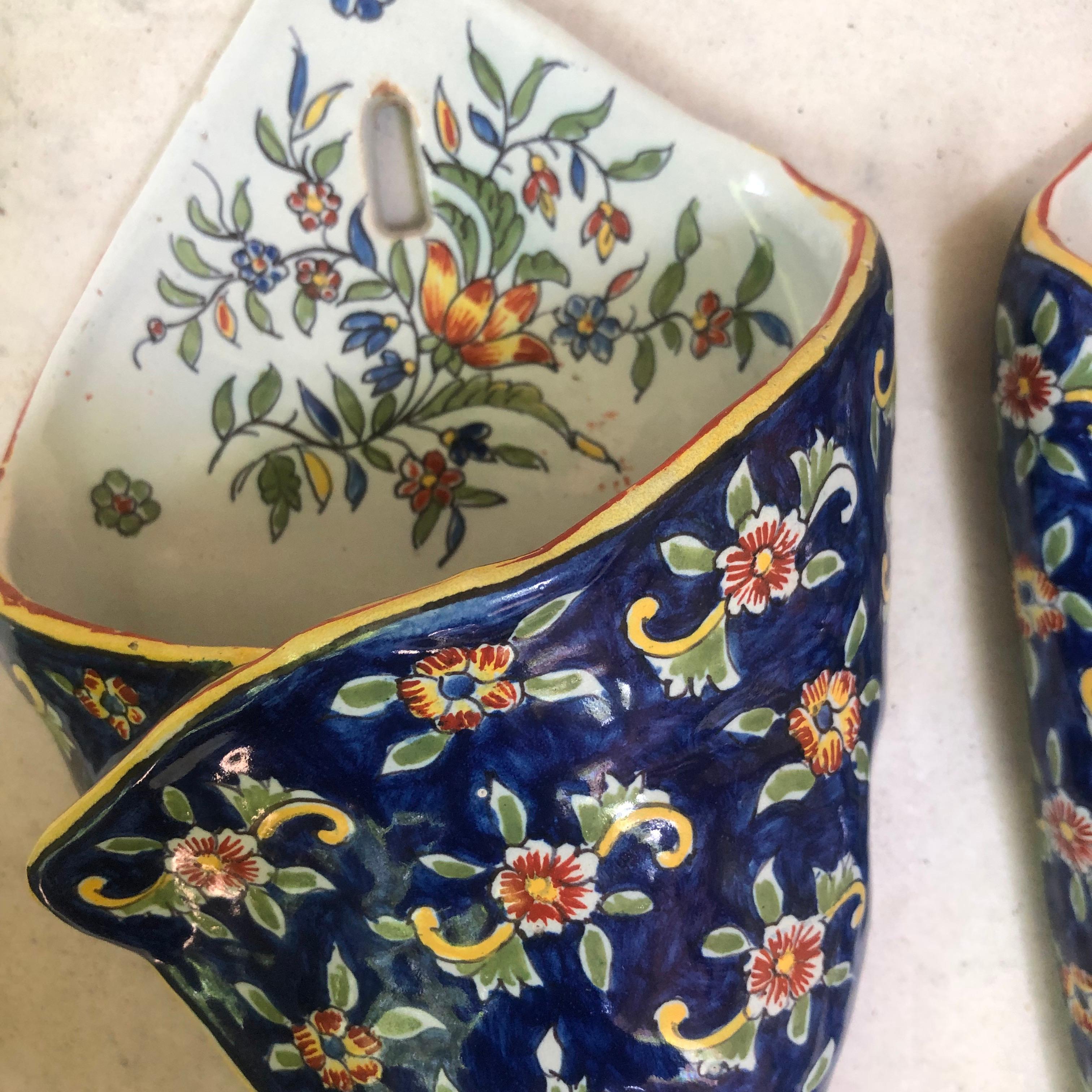 Pair of French Faience wall pocket signed Desvres Fourmaintraux Circa 1890.
 