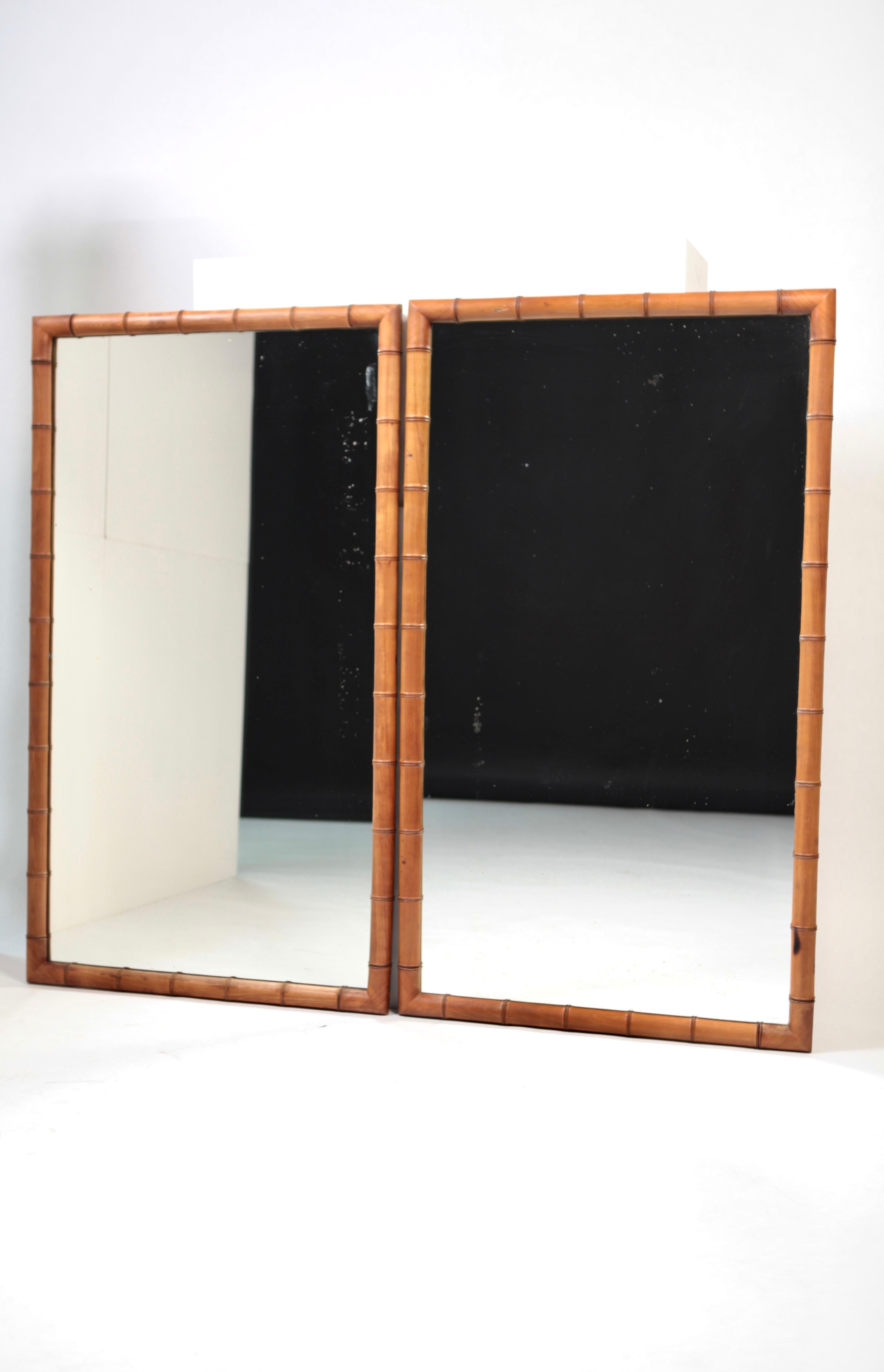 A great pair of large French 'Faux Bamboo' walnut mirrors.
Original mirror glass and backplate.
Both signed to the back 'Maison Moissard' Fontainebleau with paper label.
Pure and straight lines ensure a modern impression.
Beautiful