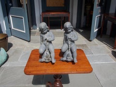 Pareja de fuentes francesas de plomo en forma de querubín cabalgando sobre tortugas, circa 1860