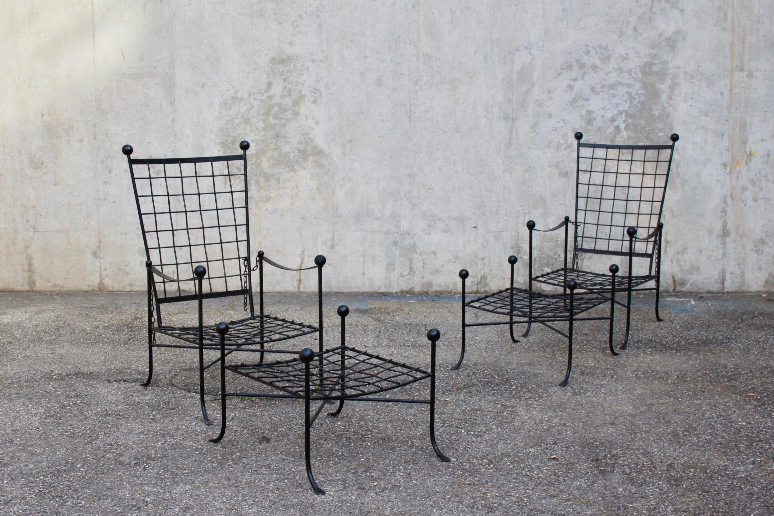 Pair of Mario Papperzini attributed garden lounge chairs with ottoman black painted metal, Swiss riviera provenance.