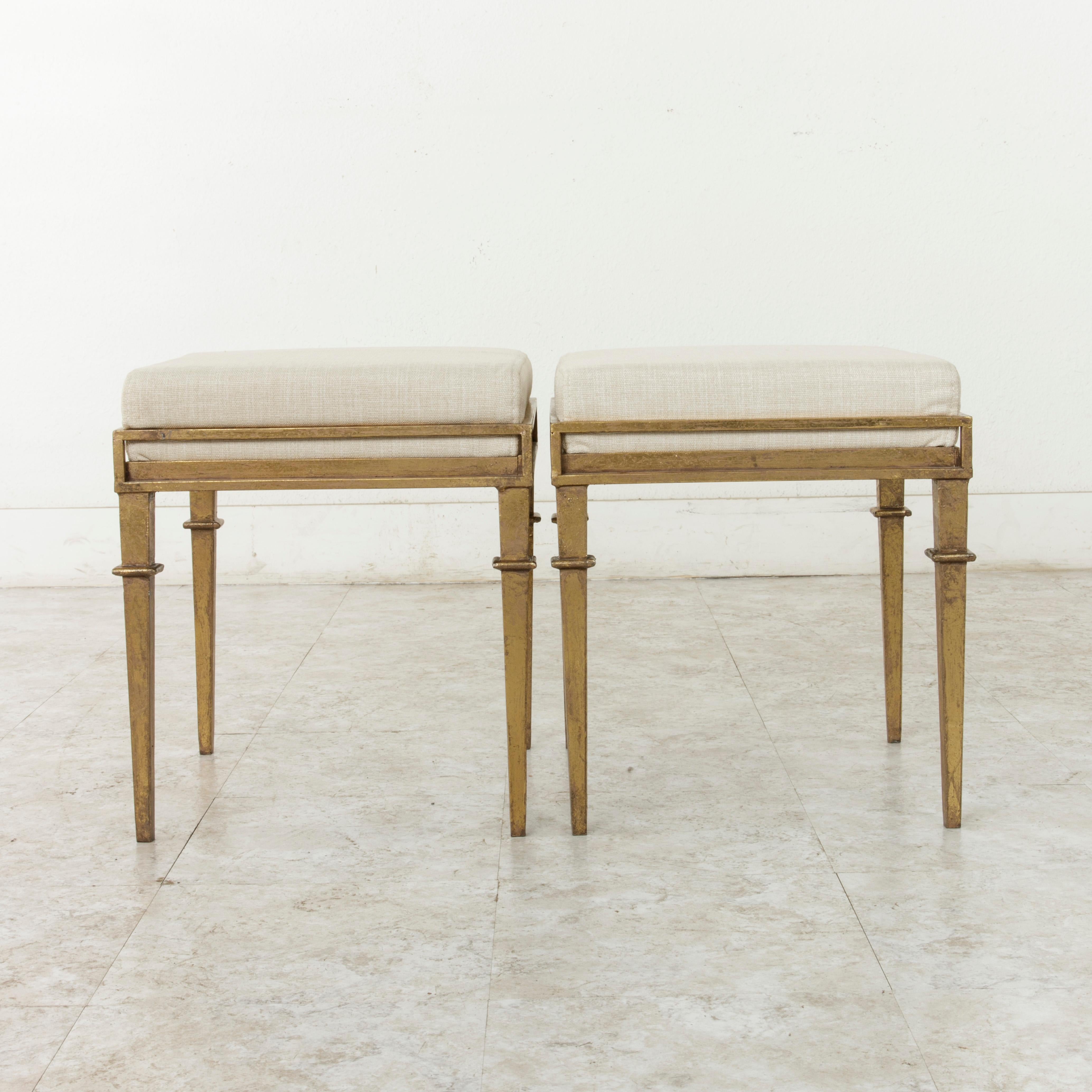 Gilt Pair of French Gilded Iron Banquettes or Benches with Linen Upholstered Cushions