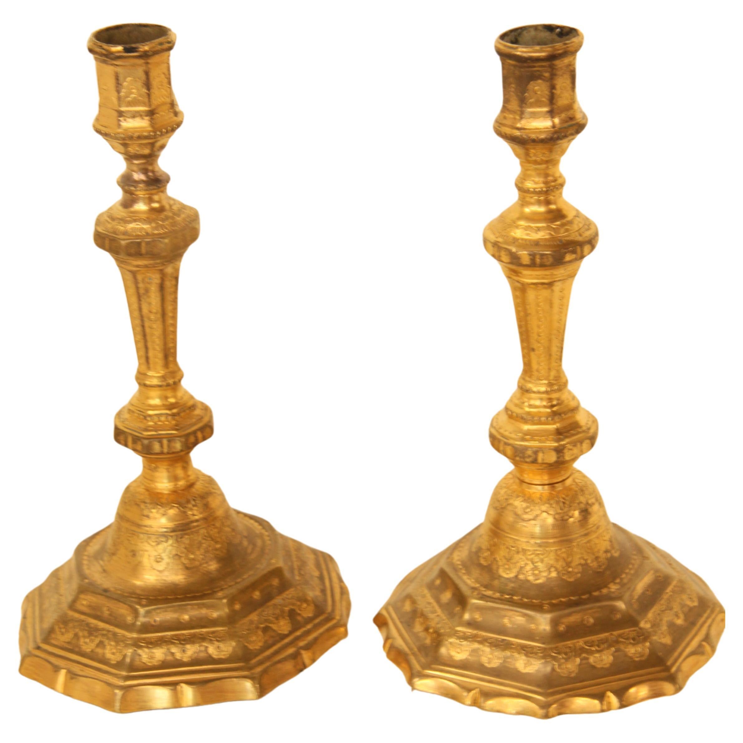 Pair of French Gilt and Chased Candlesticks For Sale