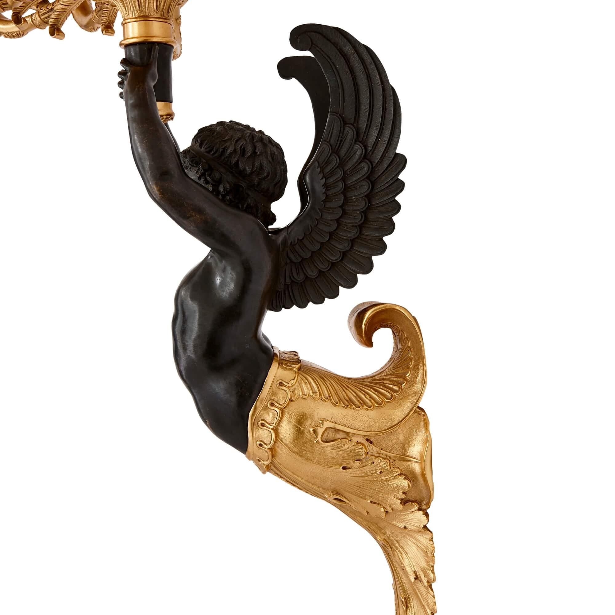 XX secolo Coppia di applique francesi in bronzo patinato e dorato in vendita