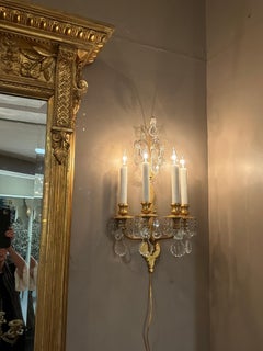 Pair of French Gilt bronze and crystal wall sconces