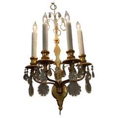 Pair of French Gilt bronze and crystal wall sconces