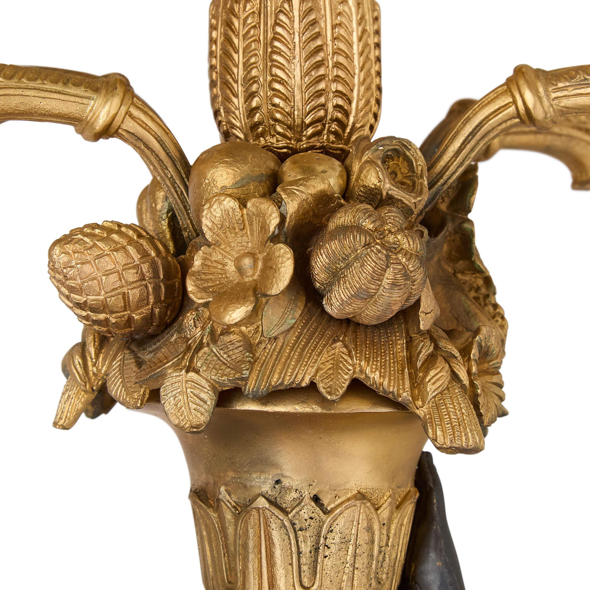 Pair of French Gilt Bronze and Patinated Bronze Candelabra In Good Condition For Sale In London, GB