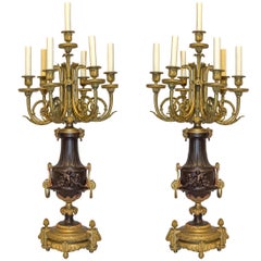 Antique Pair of French Gilt Bronze and Patinated Bronze Seven-Light Figural Candelabra