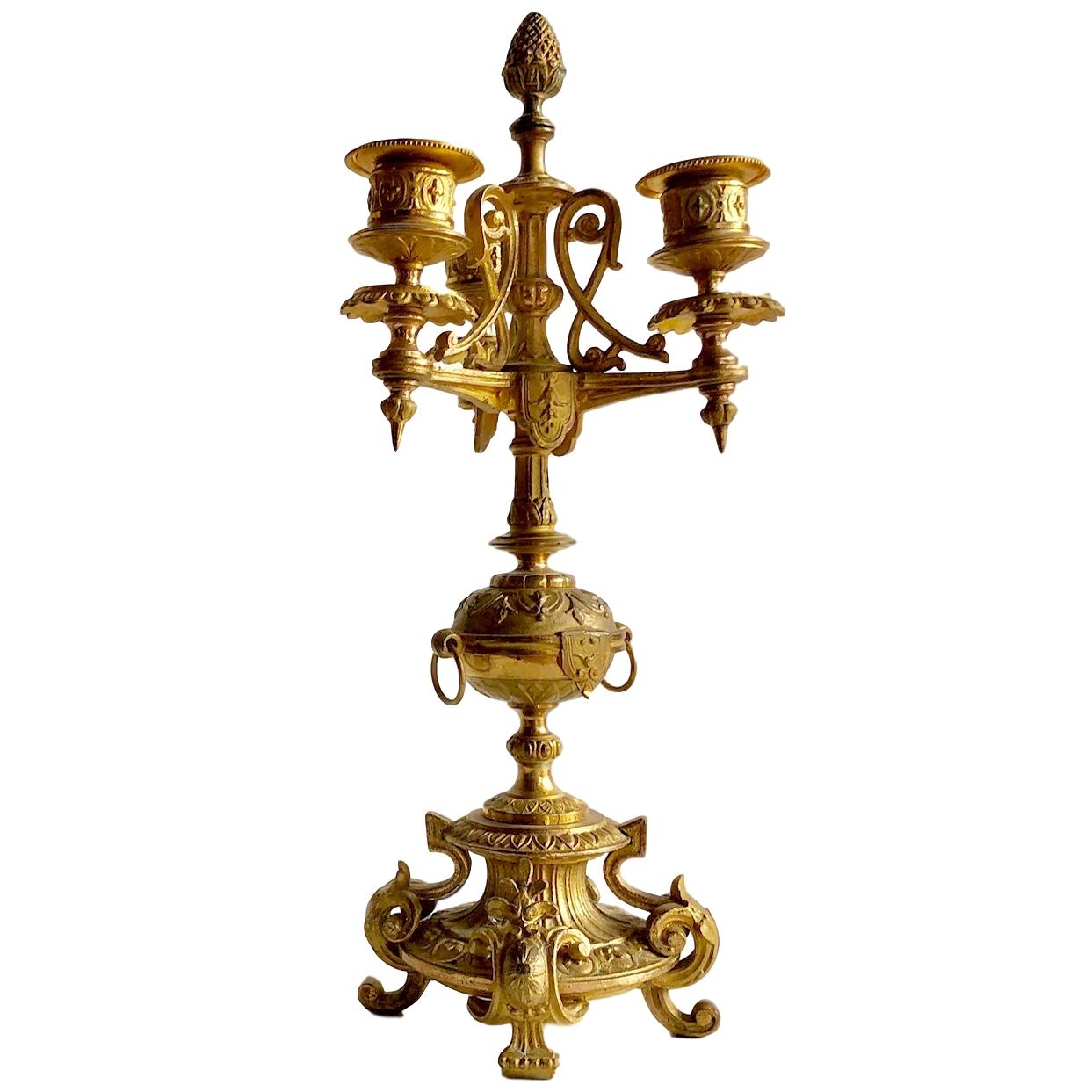 A pair of circa 1890s French bronze dore three-arm candelabra.

Measurements:
Height 14.25