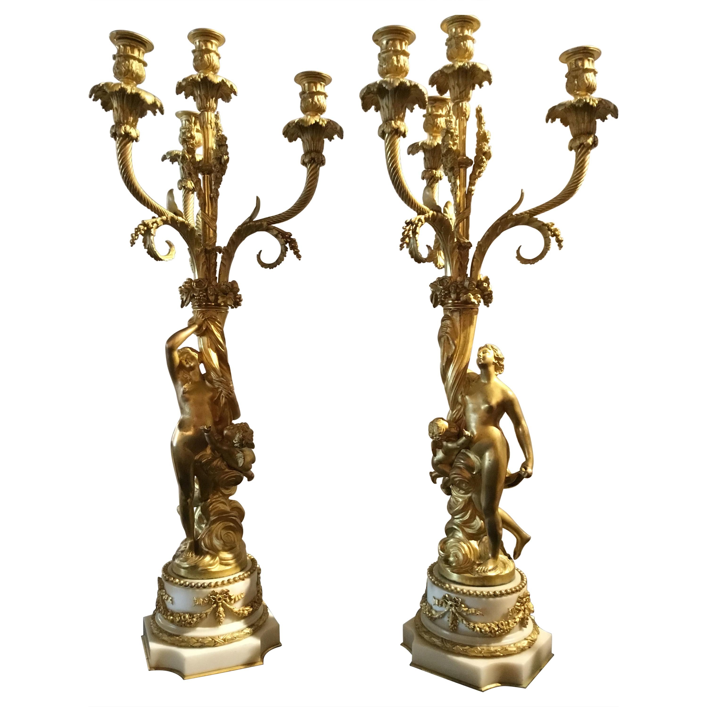 Pair of French Gilt Bronze Figural Candelabra circa 1790 on White Marble Bases