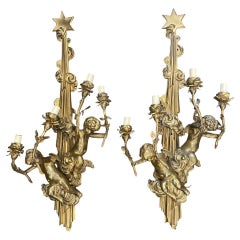 Pareja de candelabros figurados franceses de cuatro luces en bronce dorado, finales del siglo XIX.