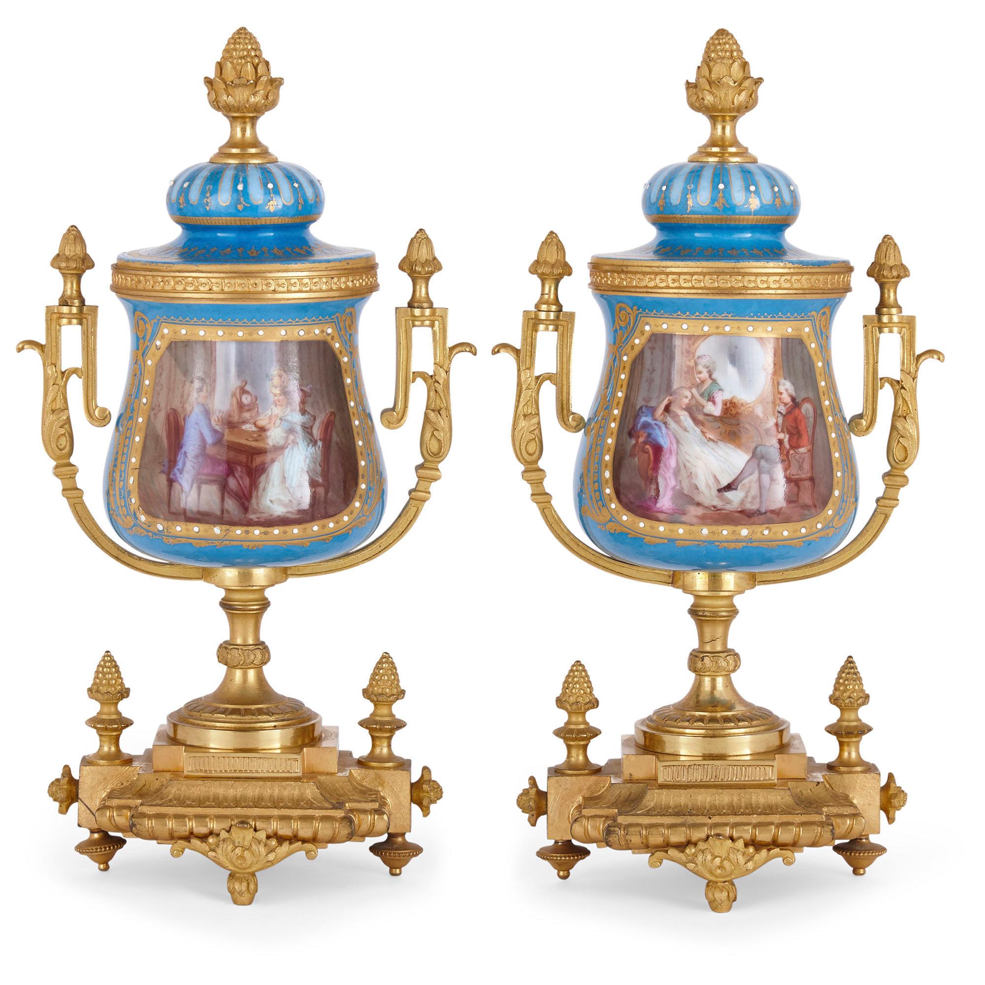 Pair of French gilt bronze mounted porcelain vases
French, late 19th century
Measures: Height 28cm, width 14cm, depth 10cm

This wonderful pair of little vases is crafted from porcelain and gilt bronze in the distinctive Rococo style. Each vase