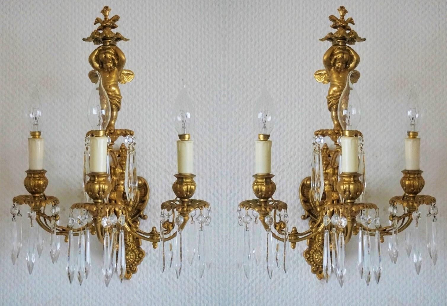 Empire Pair of French Gilt Bronze Putti Three-Arm Wall Sconces, Early 19th Century