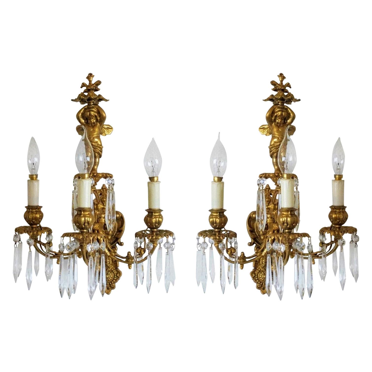 Pair of French Gilt Bronze Putti Three-Arm Wall Sconces, Early 19th Century