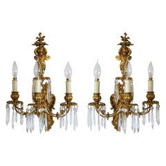 Pair of French Gilt Bronze Putti Three-Arm Wall Sconces, Early 19th Century
