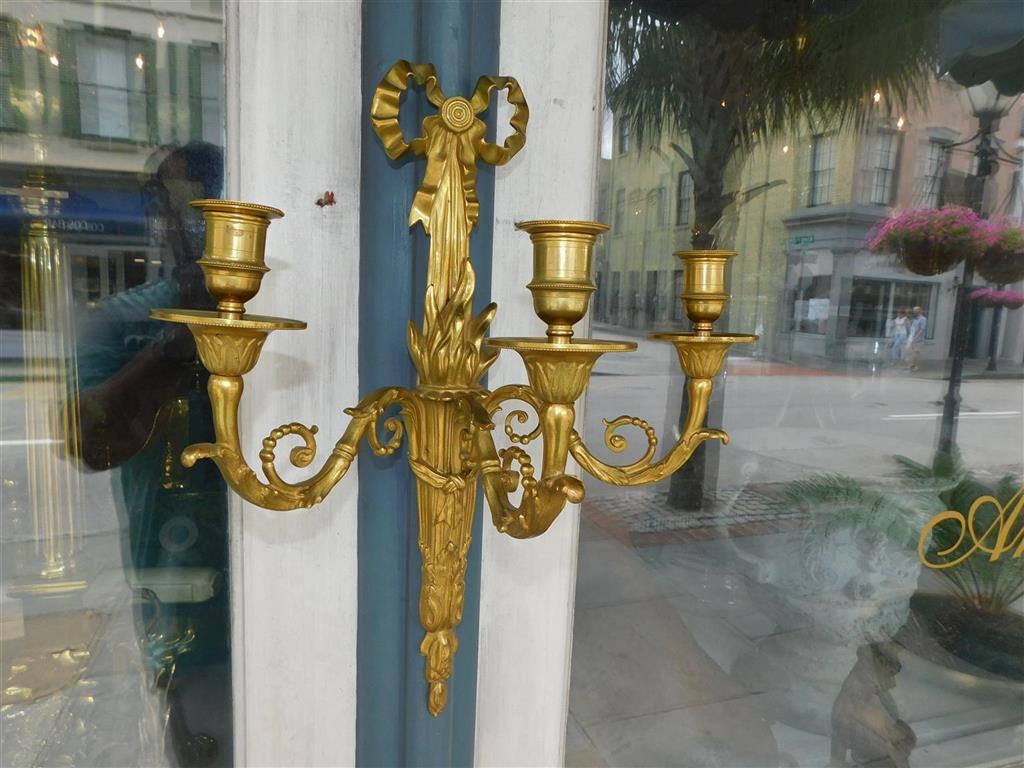 Early 19th Century Pair of French Gilt Bronze Ribbon & Foliage Three Arm Wall Sconces, Circa 1820 For Sale