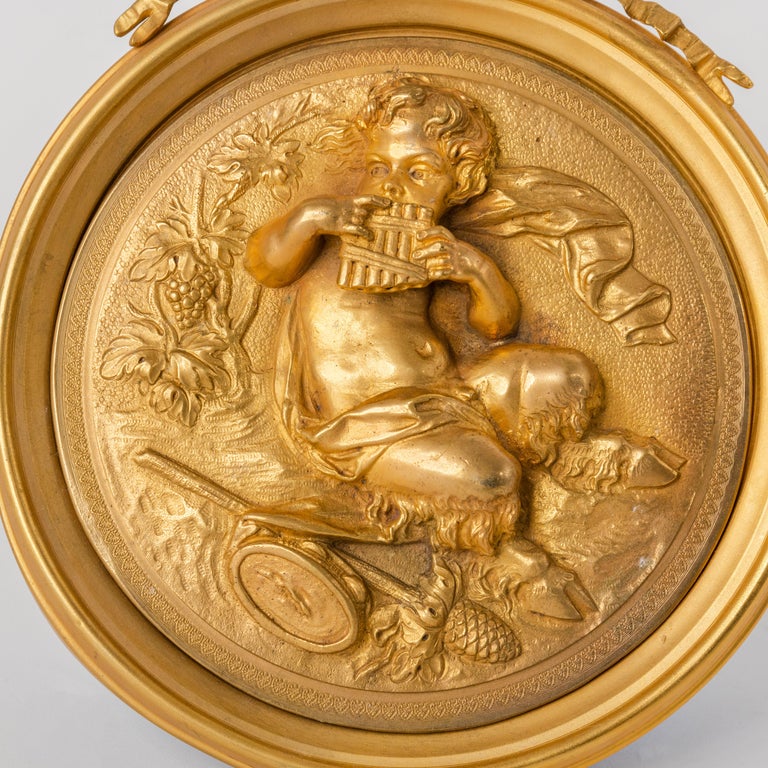 Pair of French Gilt Bronze Round Figural Wall Plaques, France, 19th Century For Sale at 1stDibs