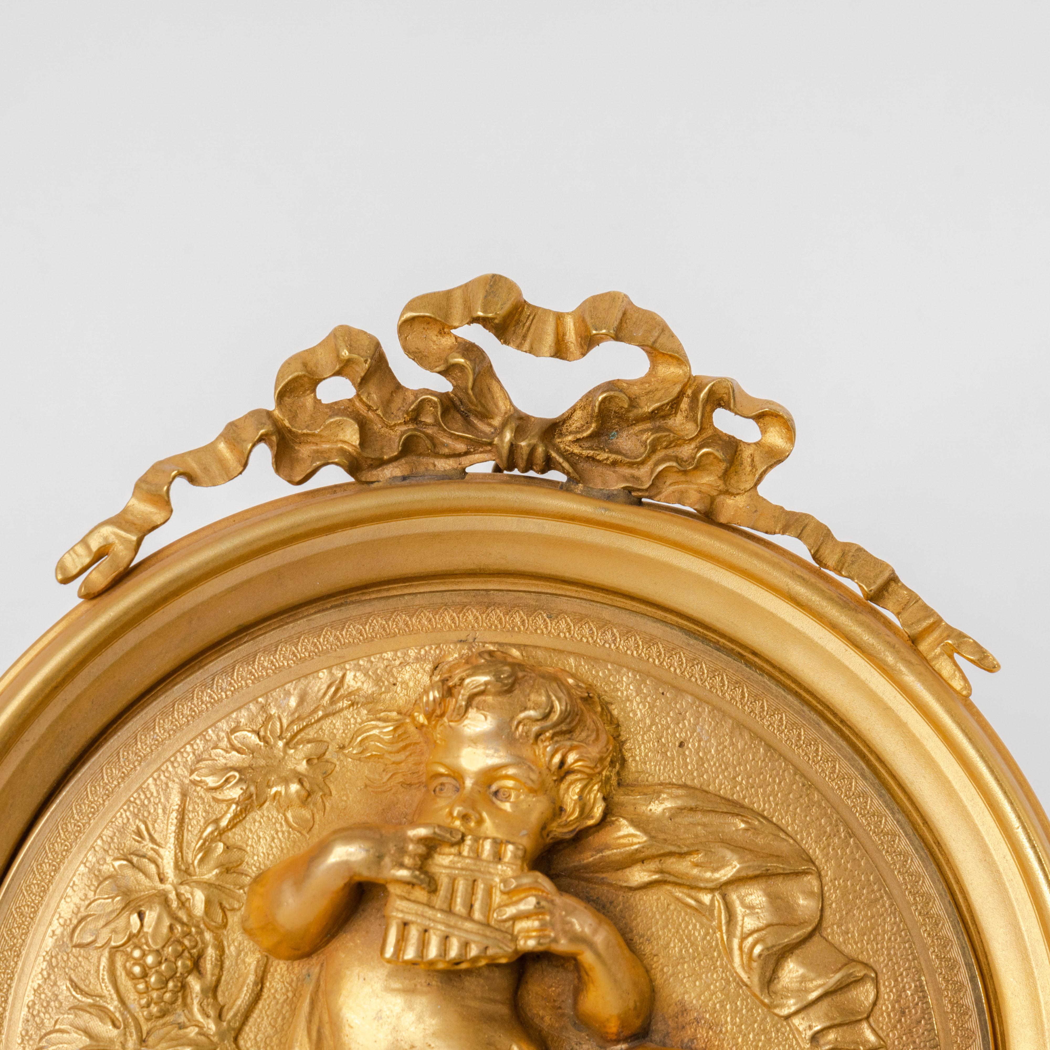 Cast Pair of French Gilt Bronze Round Figural Wall Plaques, France, 19th Century For Sale