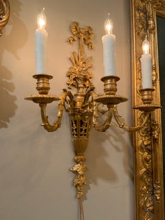 Pair of French gilt bronze Sconces, 19 th century, three light, wired