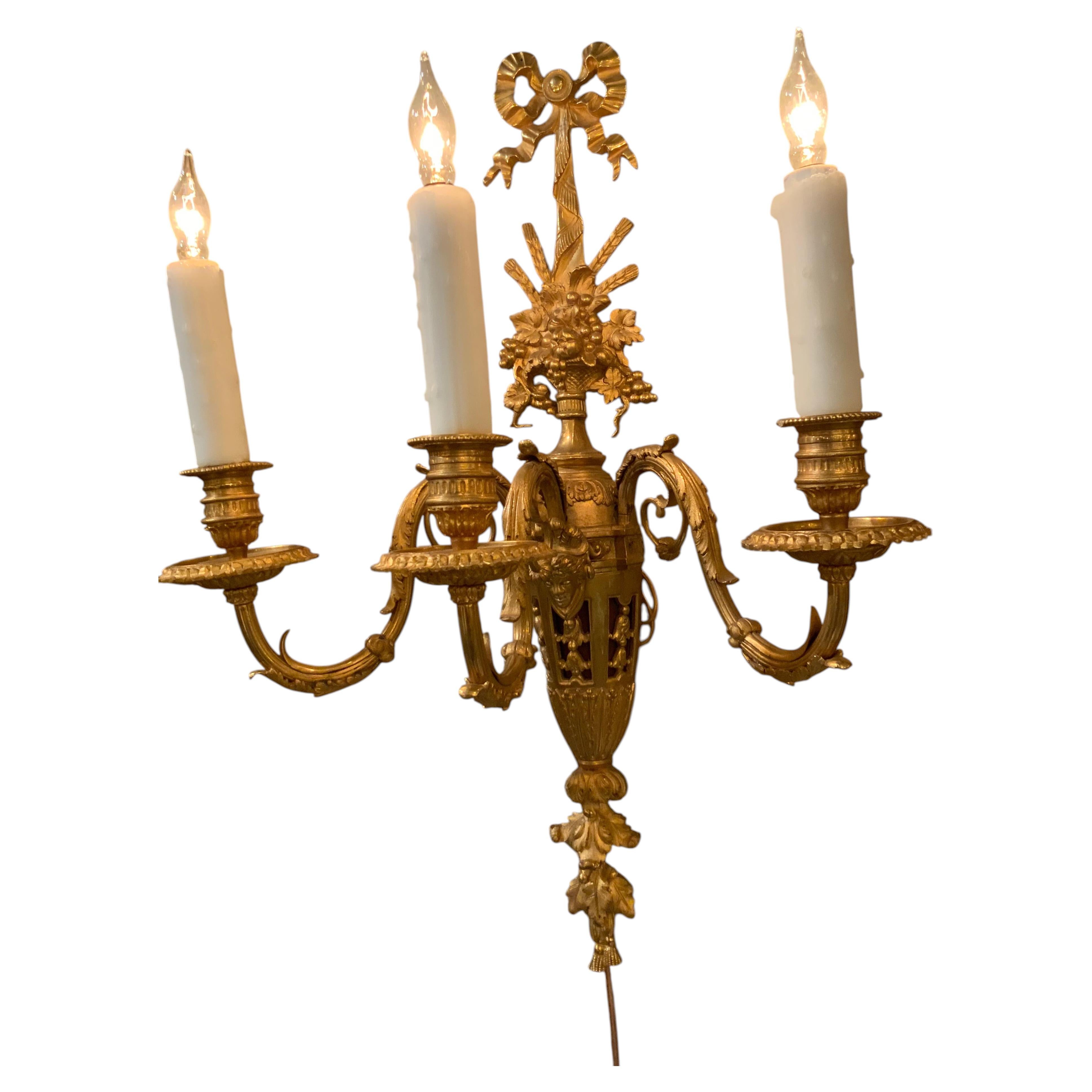 Pair of French gilt bronze Sconces, 19 th century, three light, wired
