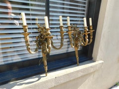 Pair of French Gilt Bronze Three Arm Sconces. Circa 1810