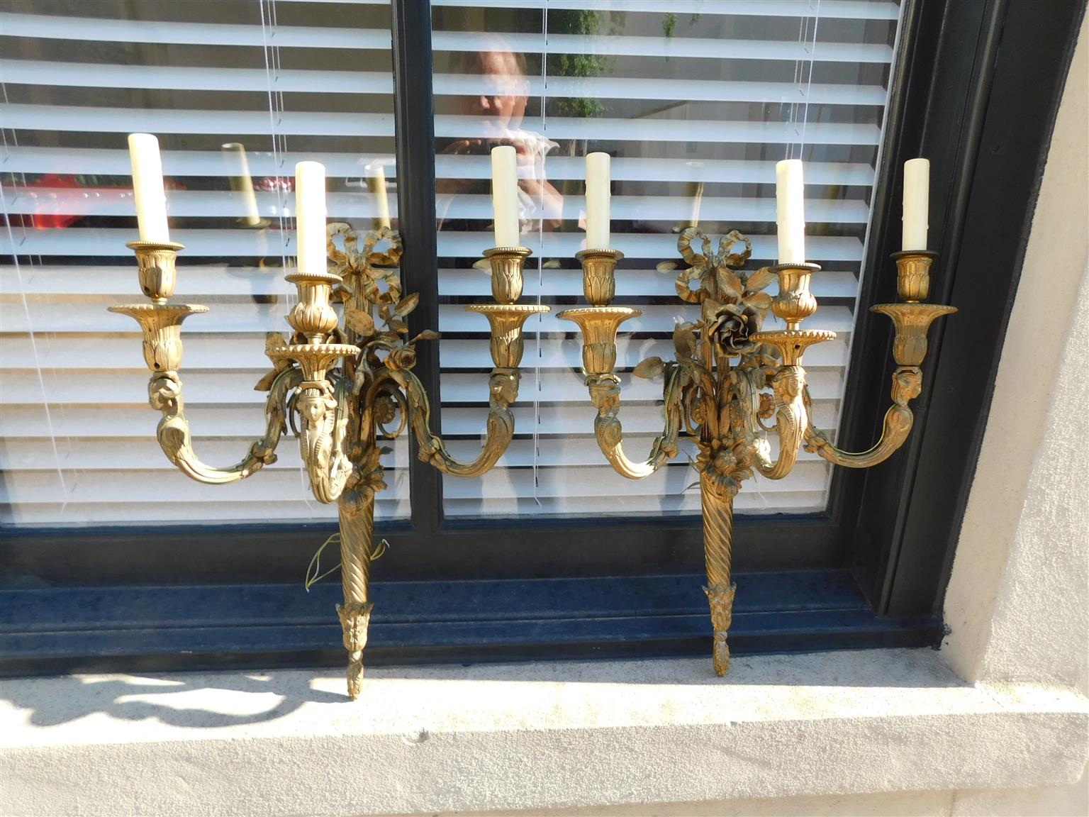 Pair of French Gilt Bronze Three Arm Sconces. Circa 1810 For Sale