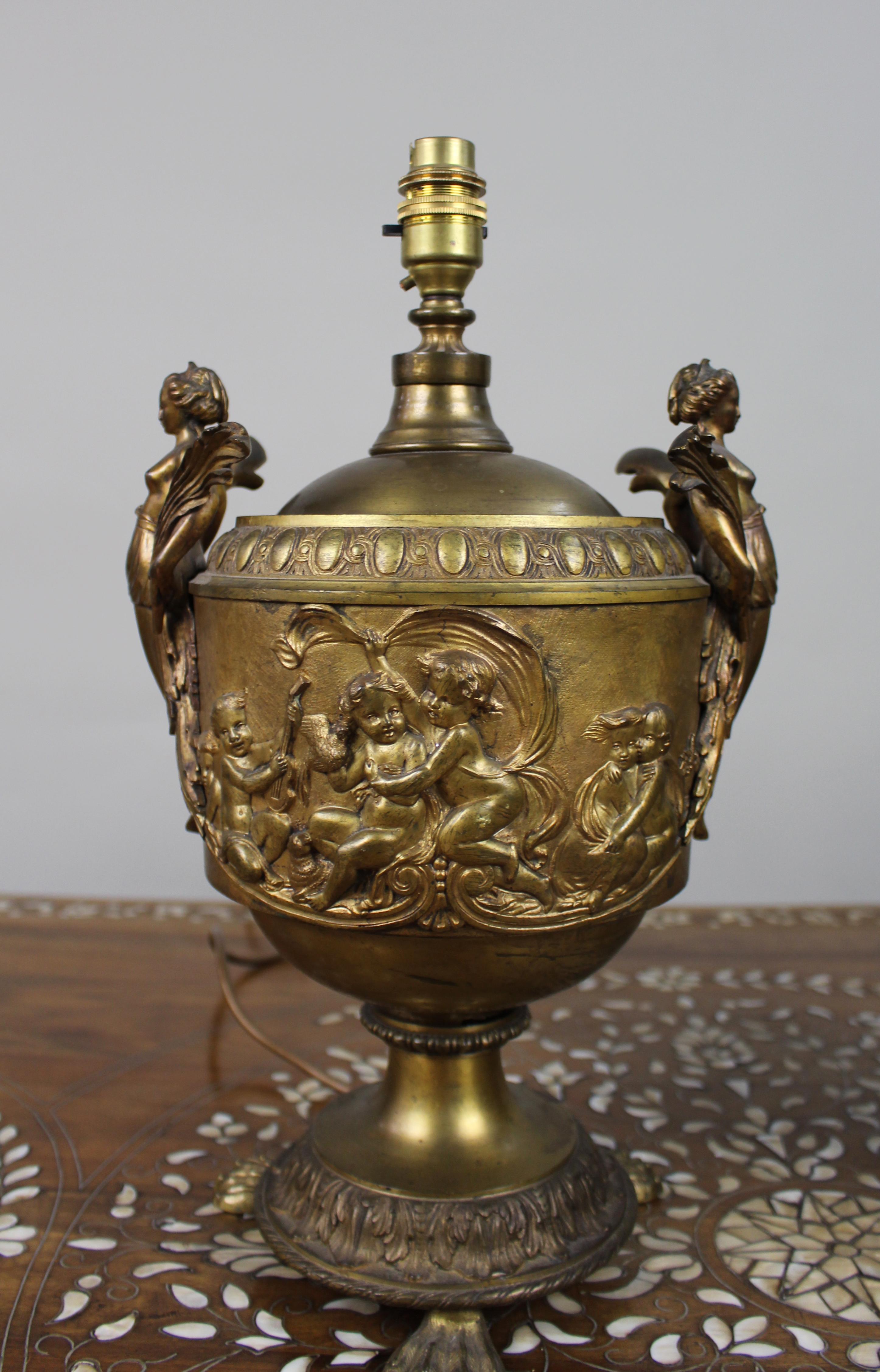 20th Century Pair of French Gilt Bronze Urn Lamps with Putti Reliefs, circa 1900 For Sale