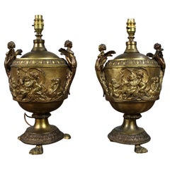 Pair of French Gilt Bronze Urn Lamps with Putti Reliefs, circa 1900
