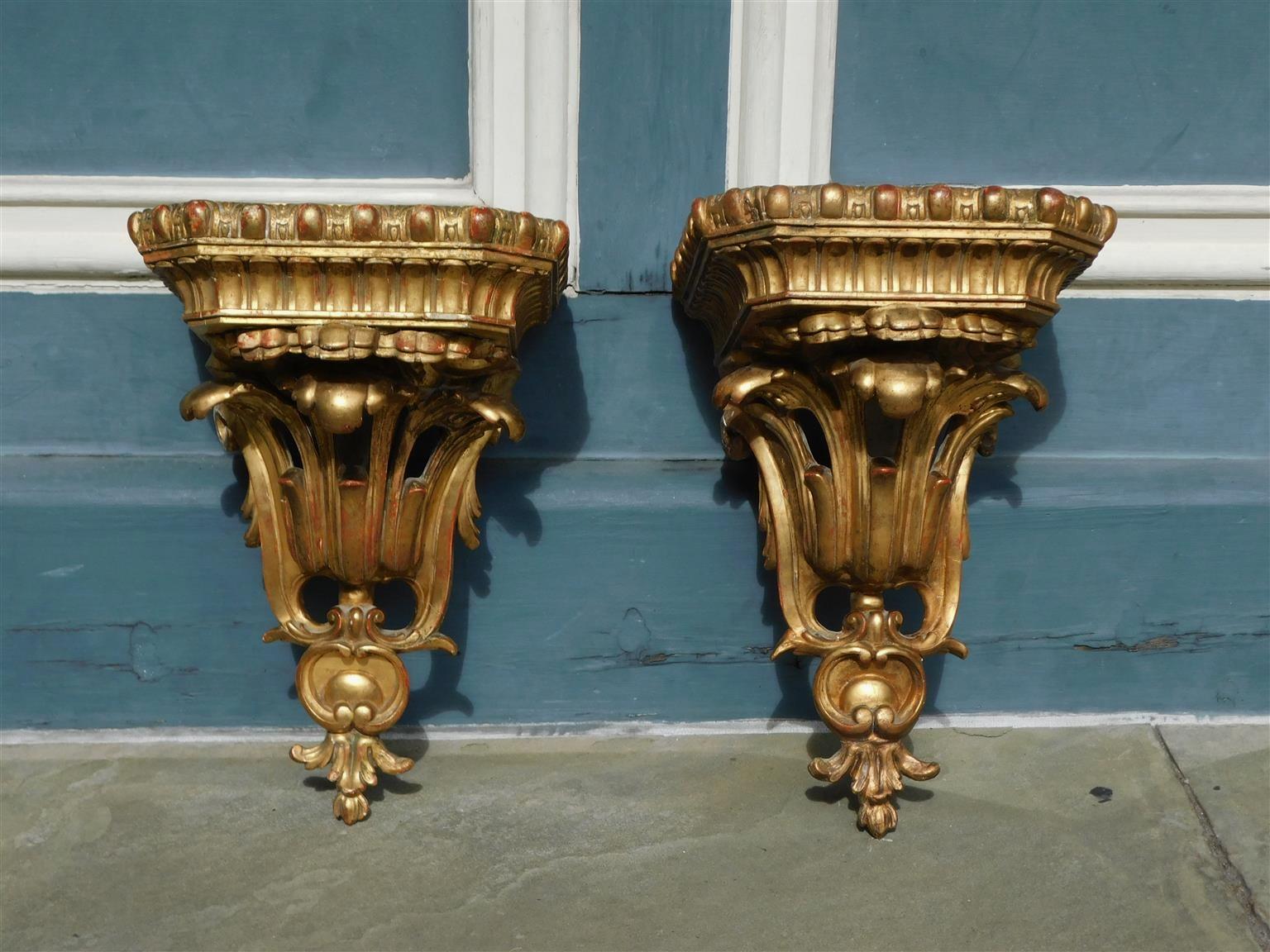 Pair of French gilt wood and gesso decorative carved foliage and gadrooned hanging wall brackets, Early 19th century.