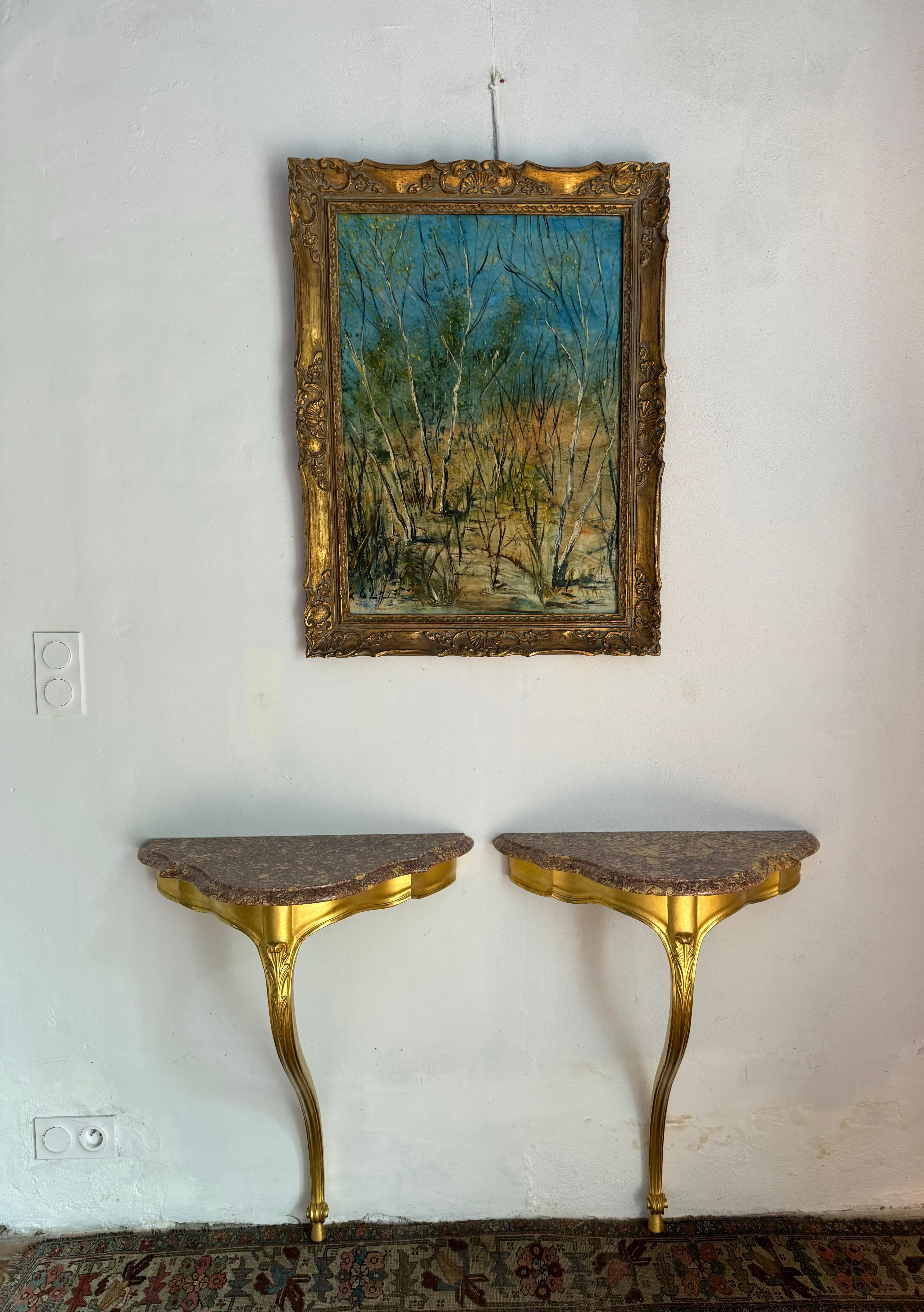 Pareja de consolas francesas de madera dorada y mármol siglo XX en venta