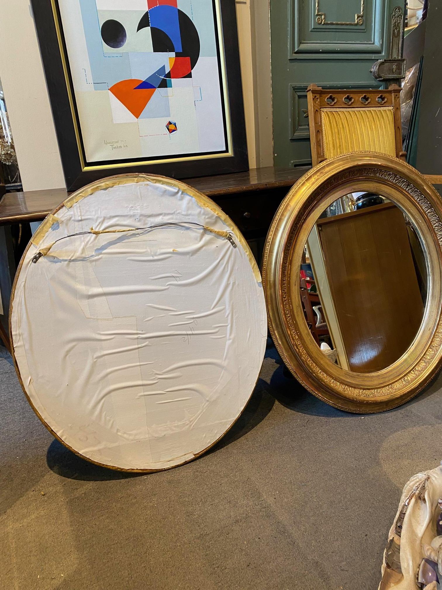 Pair of French Giltwood Napoleon III Oval Mirrors 7