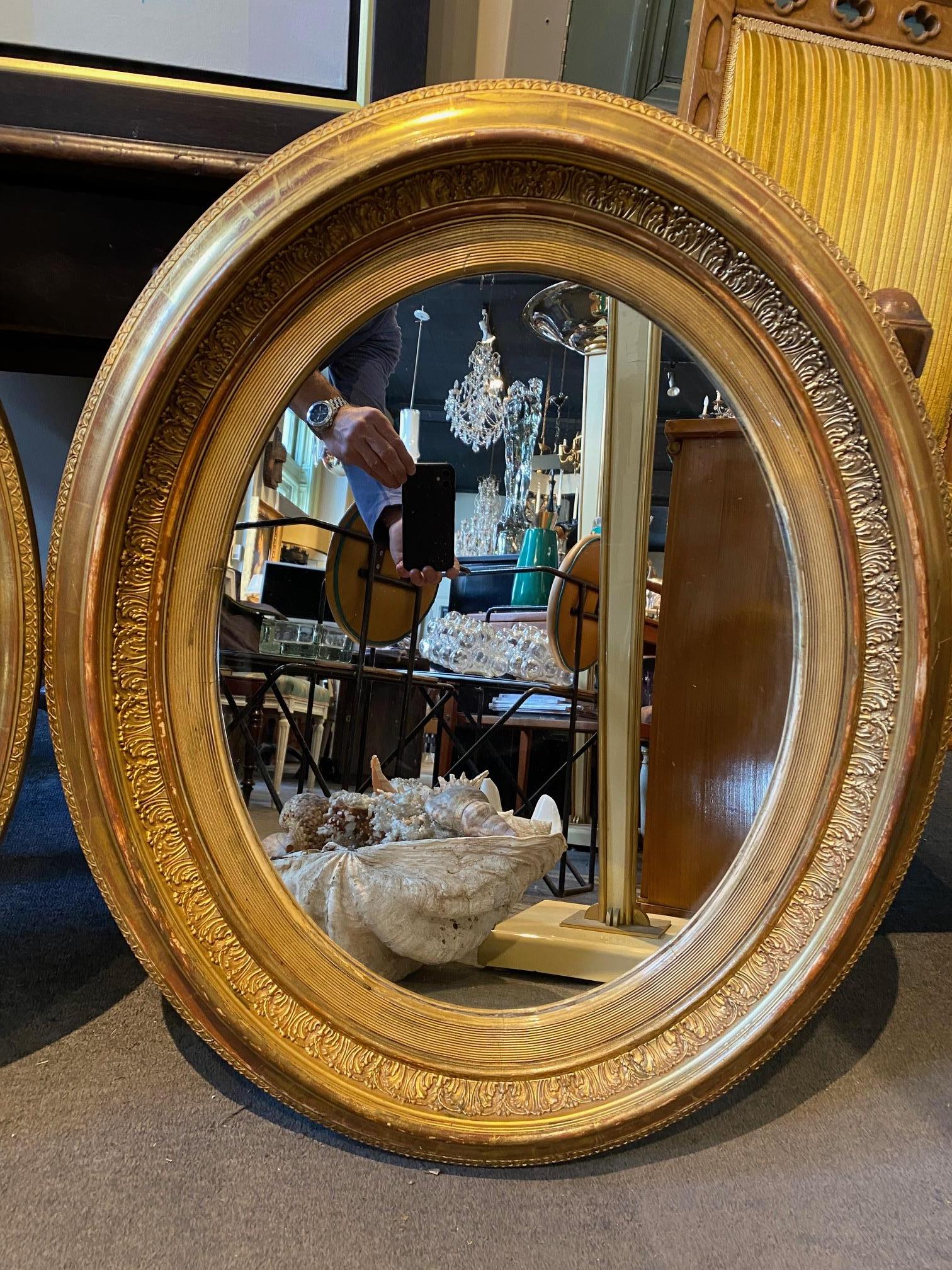 Pair of French Giltwood Napoleon III Oval Mirrors In Good Condition In Montreal, QC