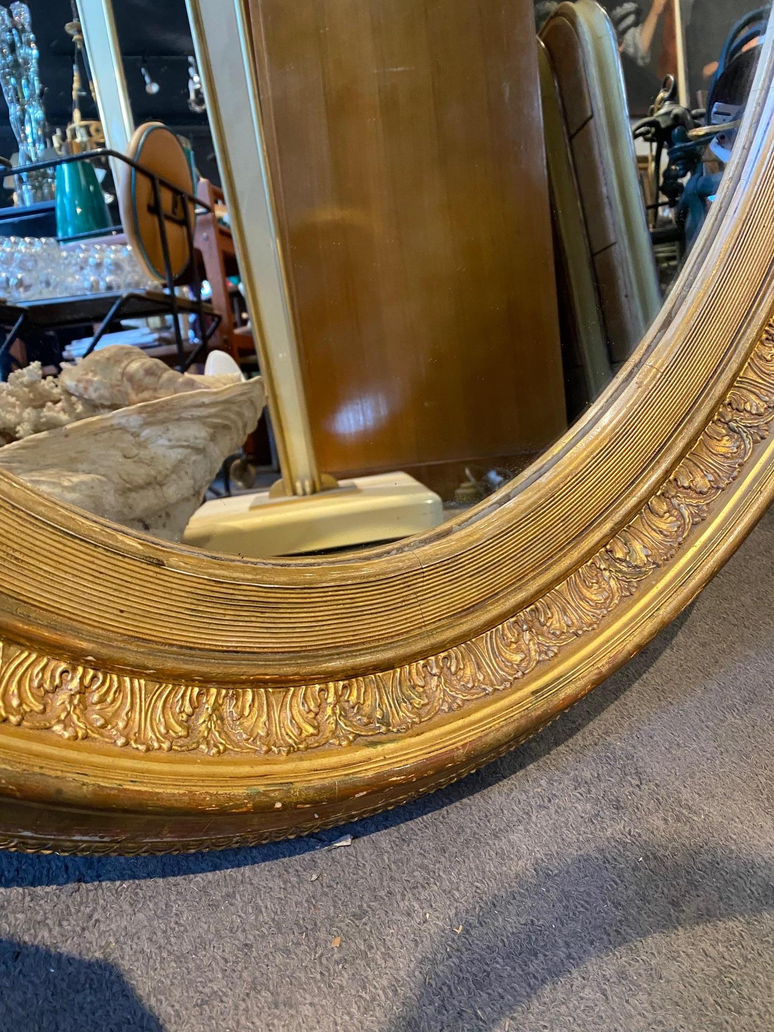 Pair of French Giltwood Napoleon III Oval Mirrors 4